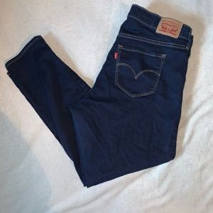 Levis Women's 311 Shaping Mid Rise Skinny Jeans. Dark wash